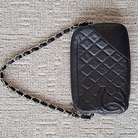 CHANEL Handbags - CHANEL Cambon Black Quilted Lambskin Leather Pochette